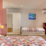 Chambre polyvalente avec lits double et simple