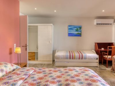 Chambre polyvalente avec lits double et simple