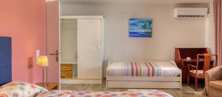 Chambre polyvalente avec lits double et simple